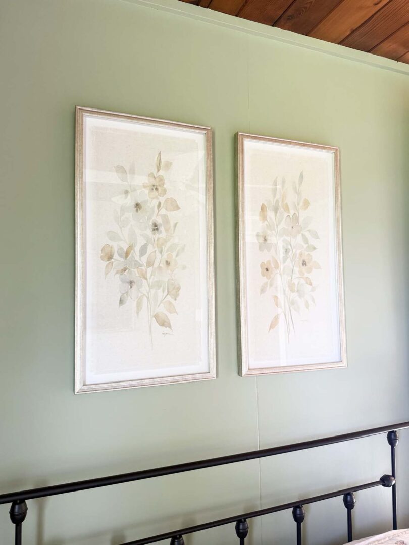 Elegant botanical wall art with soft neutral tones in a contemporary interior.