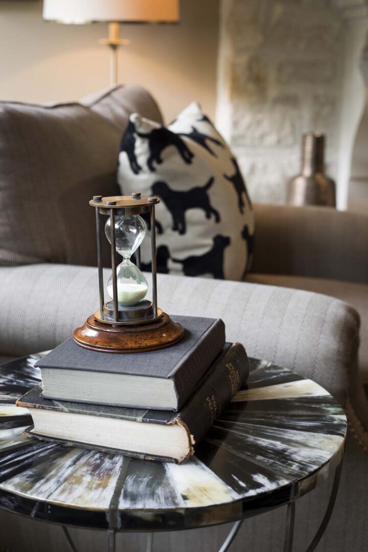 Elegant living room with decorative pillows and vintage decor.