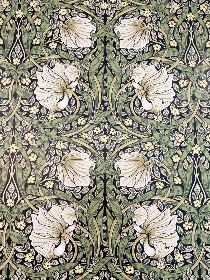 Vintage floral wallpaper pattern with white irises and green foliage.